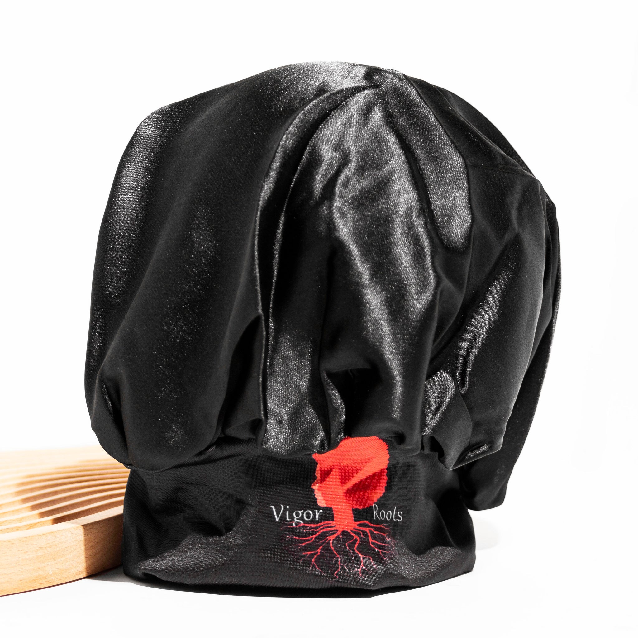 Safeguard your hair from damaging friction and look gorgeous while doing so with the Vigor Roots Satin Bonnet.